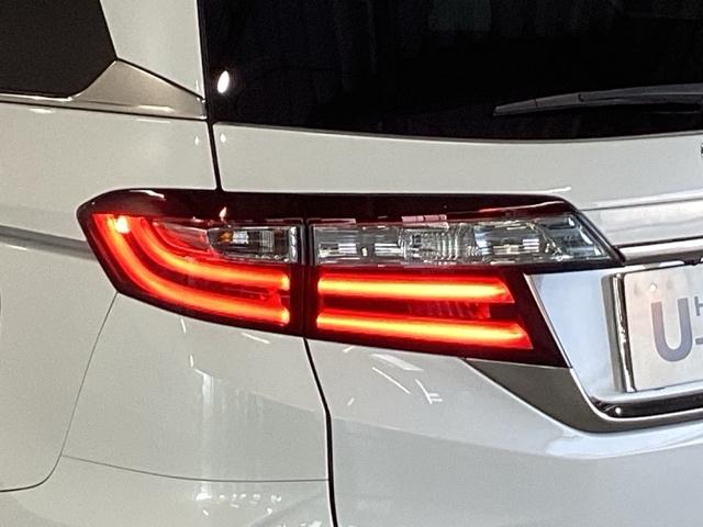 オデッセイハイブリッド ハイブリッドアブソルート・ホンダセンシング　純正メモリーナビ　パワーシート　ＥＴＣ　サイドカーテンエアバック　リアカメラ　Ｐシート　フルオートエアコン　ＡＢＳ　キーレス　ＶＳＡ　Ｗエアバッグ　ＬＥＤライト　３列シート　パワーウィンドウ　ナビＴＶ（29枚目）