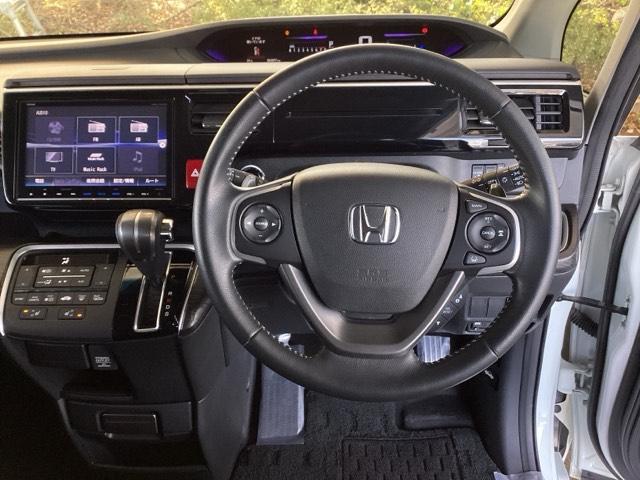 ステップワゴンスパーダ スパーダ・クールスピリットホンダセンシング　純正ナビ　フルセグ　リア席モニター　サイドエアバック　スマートキ　左右電動スライドドア　バックモニタ　地ＴＶ　ナビ＆ＴＶ　助手席エアバッグ　ＡＡＣ　横滑り防止機能　ターボ車　シートヒータ　ＡＢＳ（18枚目）