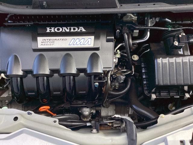 フィットハイブリッド スマートセレクション　メモリーナビ　ＥＴＣ　リアカメラ　ＤＶＤ　スマートキー　オートクルーズコントロール　イモビ　バックカメラ　キーフリー　オートエアコン　ＡＢＳ　パワーウィンドウ　パワーステアリング　ＶＳＡ　ナビＴＶ（16枚目）