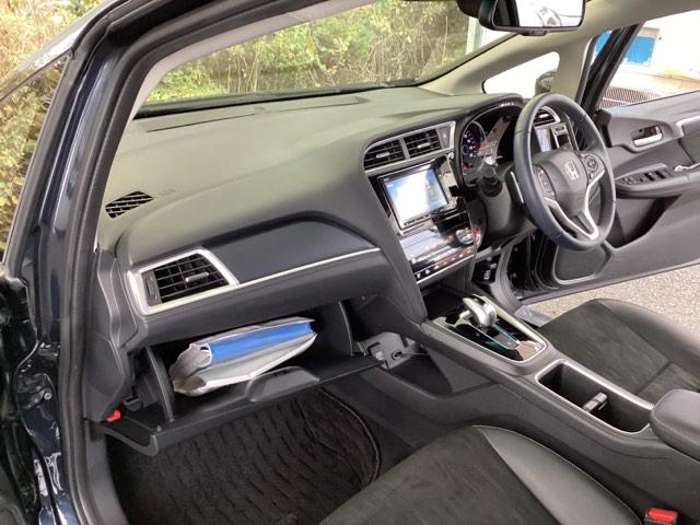 シャトル ハイブリッドＸホンダセンシング　純正メモリーナビ　シートヒーター　ＥＴＣ　横滑抑制　リヤカメラ　スマ－トキ－　イモビ　ＴＶナビ　サイドエアバッグ　キーレス　ＵＳＢ　ＤＶＤ再生機能　ＥＣＯＮ　クルコン　パワーウィンドウ　Ｗエアバック（34枚目）