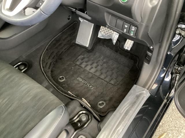 シャトル ハイブリッドＸホンダセンシング　純正メモリーナビ　シートヒーター　ＥＴＣ　横滑抑制　リヤカメラ　スマ－トキ－　イモビ　ＴＶナビ　サイドエアバッグ　キーレス　ＵＳＢ　ＤＶＤ再生機能　ＥＣＯＮ　クルコン　パワーウィンドウ　Ｗエアバック（52枚目）