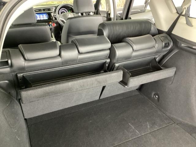 シャトル ハイブリッドＸホンダセンシング　純正メモリーナビ　シートヒーター　ＥＴＣ　横滑抑制　リヤカメラ　スマ－トキ－　イモビ　ＴＶナビ　サイドエアバッグ　キーレス　ＵＳＢ　ＤＶＤ再生機能　ＥＣＯＮ　クルコン　パワーウィンドウ　Ｗエアバック（63枚目）