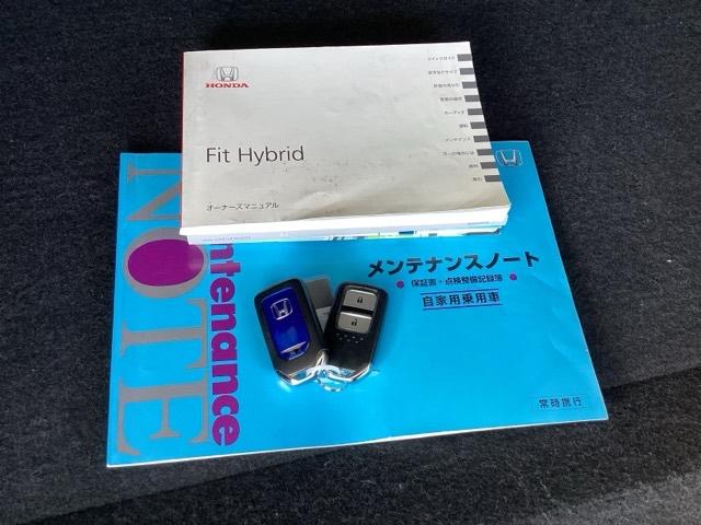 フィットハイブリッド Ｆパッケージ　メモリーナビ　衝突低減ブレーキ　ＥＴＣ　地デジＴＶ　盗難警報装置　記録簿有り　ＡＵＴＯエアコン　カーテンエアバック　助手席エアバック　ＥＣＯＮ　リヤカメラ　ＡＢＳ付　横滑り防止システム　ナビテレビ（19枚目）