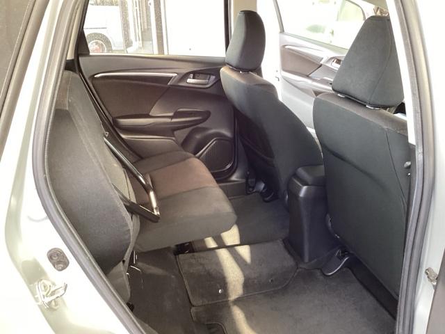 フィットハイブリッド Ｆパッケージ　メモリーナビ　衝突低減ブレーキ　ＥＴＣ　地デジＴＶ　盗難警報装置　記録簿有り　ＡＵＴＯエアコン　カーテンエアバック　助手席エアバック　ＥＣＯＮ　リヤカメラ　ＡＢＳ付　横滑り防止システム　ナビテレビ（58枚目）