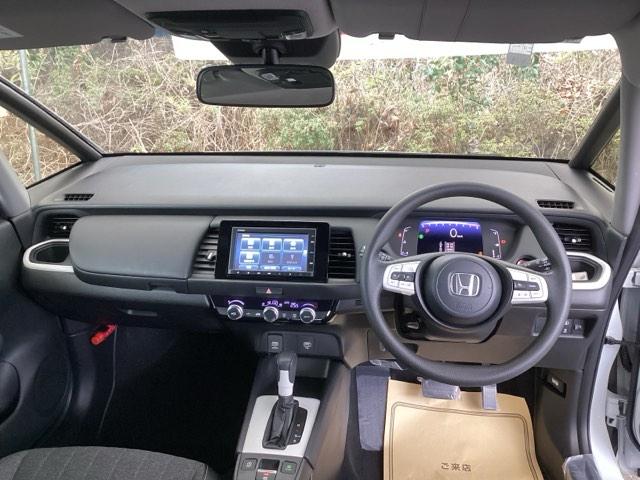 フィット ホーム 純正メモリーナビ リアカメラ カーテンエアバック サポカー LEDヘットライト オートクルーズ 前後障害物センサー 横滑り防止機能 アイドリングストップ 記録簿付 オートライト イモビ USB ABS(2枚目)