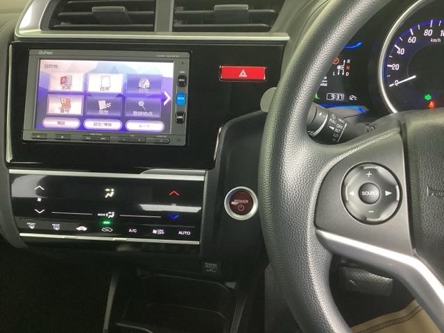 フィットハイブリッド Fパッケージ リアカメラ ETC メモリーナビ スマキー 運転席助手席エアバッグ ナビTV ECONモード キーレス 運転席エアバッグ オートエアコン ABS 地デジTV DVD視聴 パワーステアリング Rカメ(2枚目)