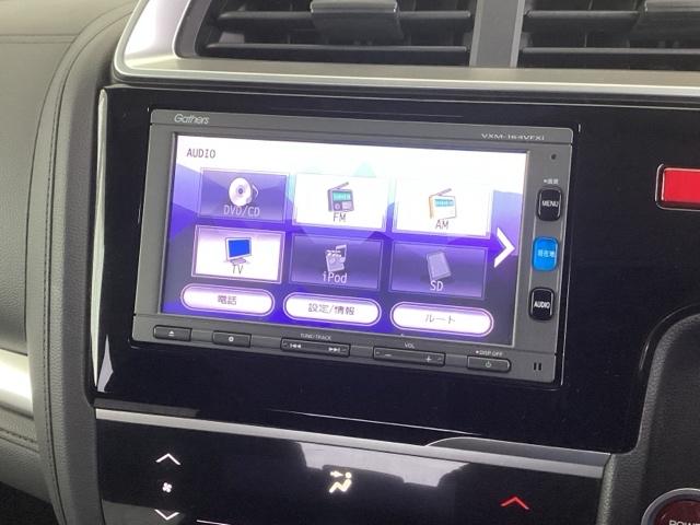 フィットハイブリッド Fパッケージ リアカメラ ETC メモリーナビ スマキー 運転席助手席エアバッグ ナビTV ECONモード キーレス 運転席エアバッグ オートエアコン ABS 地デジTV DVD視聴 パワーステアリング Rカメ(11枚目)