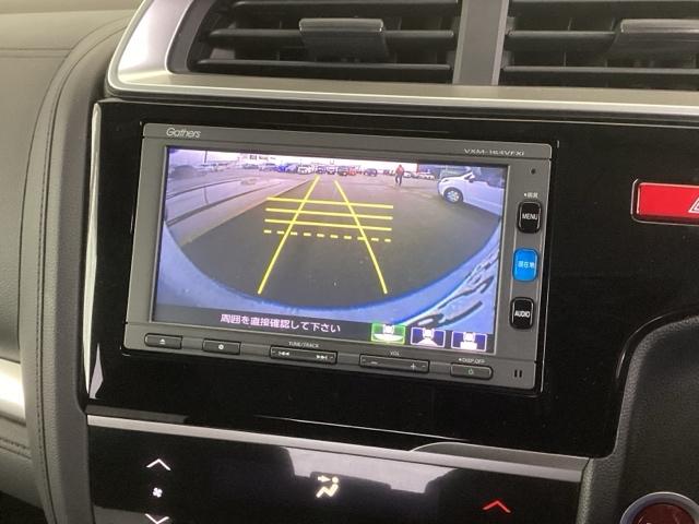 フィットハイブリッド Fパッケージ リアカメラ ETC メモリーナビ スマキー 運転席助手席エアバッグ ナビTV ECONモード キーレス 運転席エアバッグ オートエアコン ABS 地デジTV DVD視聴 パワーステアリング Rカメ(12枚目)
