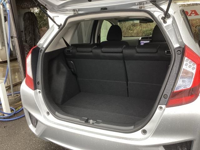 フィットハイブリッド Fパッケージ リアカメラ ETC メモリーナビ スマキー 運転席助手席エアバッグ ナビTV ECONモード キーレス 運転席エアバッグ オートエアコン ABS 地デジTV DVD視聴 パワーステアリング Rカメ(21枚目)