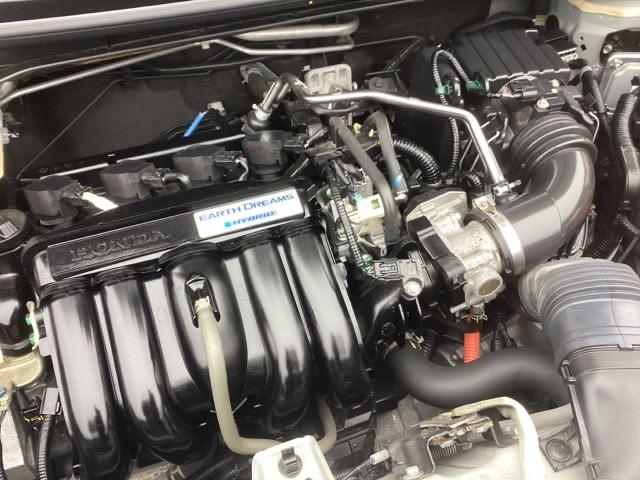 フィットハイブリッド Fパッケージ リアカメラ ETC メモリーナビ スマキー 運転席助手席エアバッグ ナビTV ECONモード キーレス 運転席エアバッグ オートエアコン ABS 地デジTV DVD視聴 パワーステアリング Rカメ(23枚目)