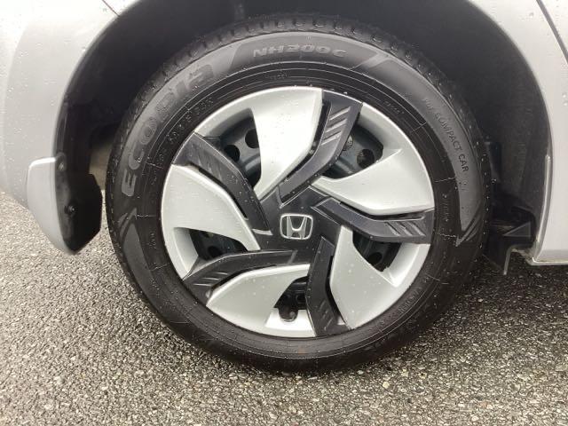 フィットハイブリッド Fパッケージ リアカメラ ETC メモリーナビ スマキー 運転席助手席エアバッグ ナビTV ECONモード キーレス 運転席エアバッグ オートエアコン ABS 地デジTV DVD視聴 パワーステアリング Rカメ(25枚目)