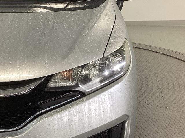 フィットハイブリッド Fパッケージ リアカメラ ETC メモリーナビ スマキー 運転席助手席エアバッグ ナビTV ECONモード キーレス 運転席エアバッグ オートエアコン ABS 地デジTV DVD視聴 パワーステアリング Rカメ(27枚目)