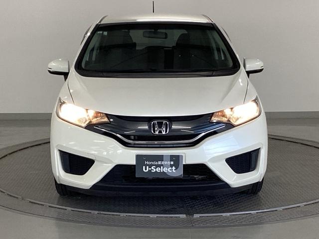 フィット 13G・Fパッケージ 純正ナビ ワンセグ リアカメラ イモビ DVD再生可能 スマ-トキ- VSA ETC付き 助手席エアバッグ Rカメラ オートエアコン エアバック PS キ-フリ- 1セグ PW ABS TVナビ(6枚目)