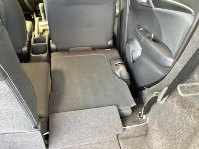 フィット 13G・Fパッケージ 純正ナビ ワンセグ リアカメラ イモビ DVD再生可能 スマ-トキ- VSA ETC付き 助手席エアバッグ Rカメラ オートエアコン エアバック PS キ-フリ- 1セグ PW ABS TVナビ(21枚目)