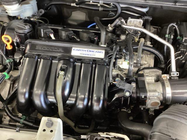 フィット 13G・Fパッケージ 純正ナビ ワンセグ リアカメラ イモビ DVD再生可能 スマ-トキ- VSA ETC付き 助手席エアバッグ Rカメラ オートエアコン エアバック PS キ-フリ- 1セグ PW ABS TVナビ(22枚目)