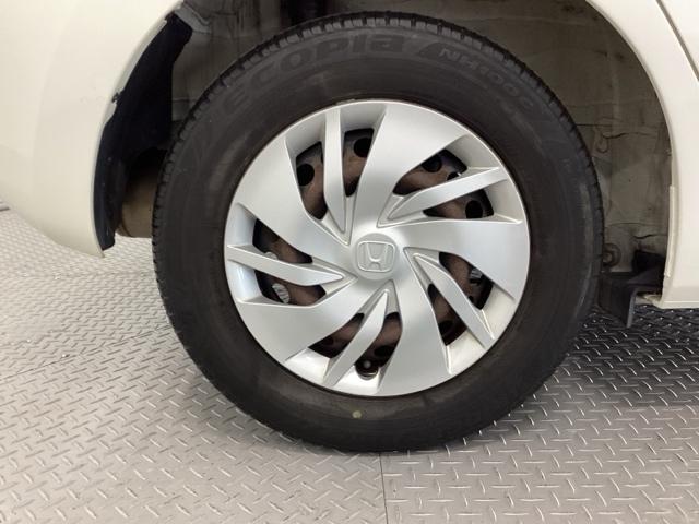 フィット 13G・Fパッケージ 純正ナビ ワンセグ リアカメラ イモビ DVD再生可能 スマ-トキ- VSA ETC付き 助手席エアバッグ Rカメラ オートエアコン エアバック PS キ-フリ- 1セグ PW ABS TVナビ(24枚目)