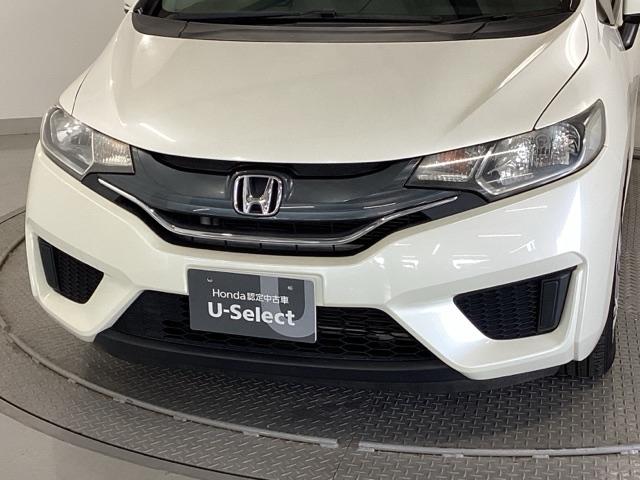 フィット 13G・Fパッケージ 純正ナビ ワンセグ リアカメラ イモビ DVD再生可能 スマ-トキ- VSA ETC付き 助手席エアバッグ Rカメラ オートエアコン エアバック PS キ-フリ- 1セグ PW ABS TVナビ(25枚目)