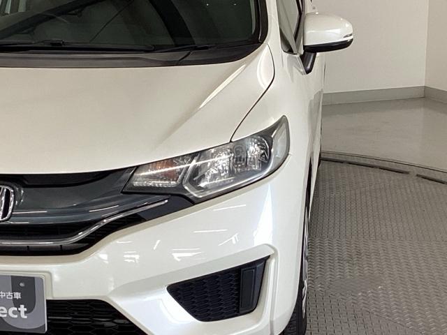 フィット 13G・Fパッケージ 純正ナビ ワンセグ リアカメラ イモビ DVD再生可能 スマ-トキ- VSA ETC付き 助手席エアバッグ Rカメラ オートエアコン エアバック PS キ-フリ- 1セグ PW ABS TVナビ(26枚目)