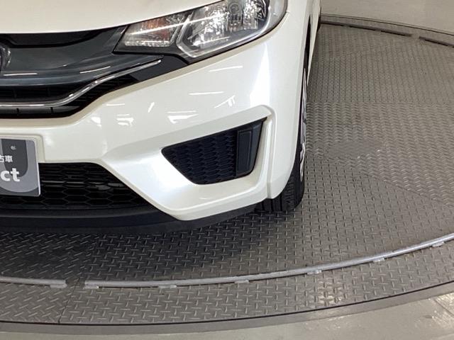 フィット 13G・Fパッケージ 純正ナビ ワンセグ リアカメラ イモビ DVD再生可能 スマ-トキ- VSA ETC付き 助手席エアバッグ Rカメラ オートエアコン エアバック PS キ-フリ- 1セグ PW ABS TVナビ(27枚目)