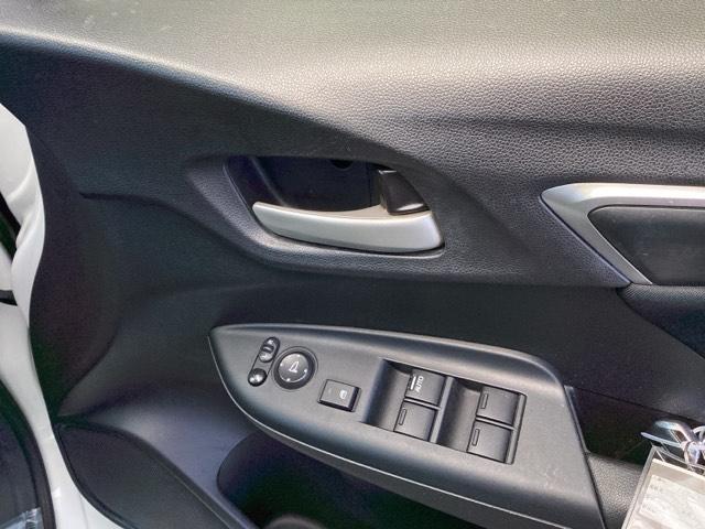 フィット 13G・Fパッケージ 純正ナビ ワンセグ リアカメラ イモビ DVD再生可能 スマ-トキ- VSA ETC付き 助手席エアバッグ Rカメラ オートエアコン エアバック PS キ-フリ- 1セグ PW ABS TVナビ(47枚目)