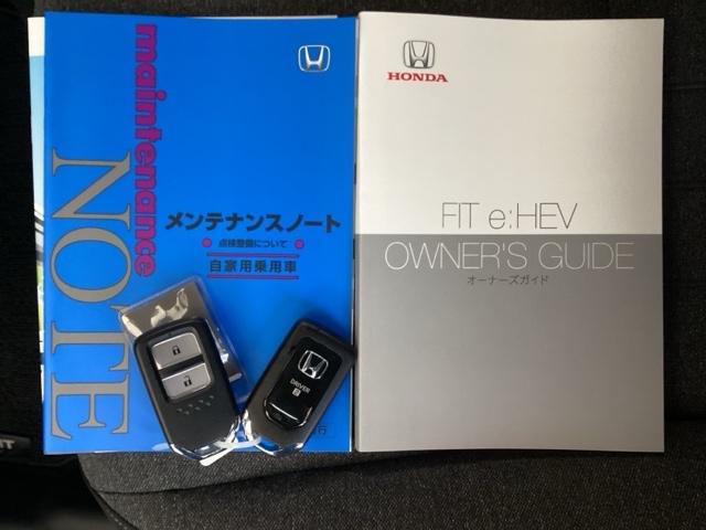フィット e:HEVホーム 純正ナビ フルセグ リアカメラ 前後誤発進抑制機能 クリソナ 助手席エアバッグ 運転席エアバッグ アイドリングストップ LEDライト USB接続 バックカメラ ABS サイドエアバッグ スマートキー(26枚目)