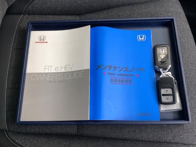 フィット e:HEVホーム 試乗車 メモリーナビ ドラレコ ETC 前後誤発進抑制機能 助手席エアバッグ 運転席エアバッグ アイドリングストップ 禁煙 LEDライト USB接続 バックカメラ ABS サイドエアバッグ DVD再生(21枚目)