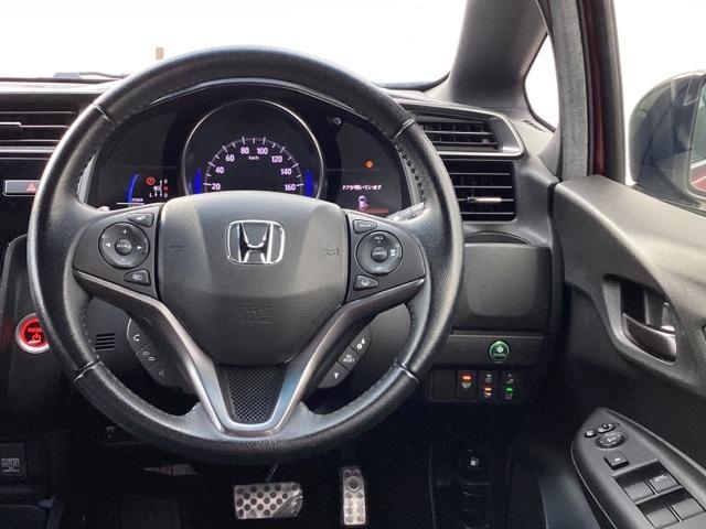 フィットハイブリッド Ｓホンダセンシング　ホンダ純正メモリーナビ　ドラレコ　スマ－トキ－　ナビＴＶ　アクティブクルーズコントロール　パワーウインドウ　ドライブレコーダ　サイドエアバック　ＤＶＤ再生　パワーステアリング　整備記録簿　ＡＢＳ（32枚目）