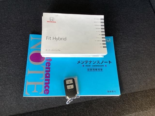 フィットハイブリッド Ｓパッケージ　純正メモリーナビ　衝突低減ブレーキ　点検記録簿　サイドエアバック　リアカメラ　ＵＳＢ　ＶＳＡ　クルコン　地デジＴＶ　イモビライザー　パワーウィンドウ　スマキー　ＤＶＤ再生　ナビＴＶ　ＥＴＣ付　パワステ（19枚目）