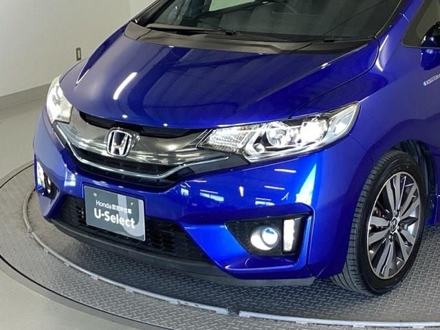 フィットハイブリッド Ｓパッケージ　純正メモリーナビ　衝突低減ブレーキ　点検記録簿　サイドエアバック　リアカメラ　ＵＳＢ　ＶＳＡ　クルコン　地デジＴＶ　イモビライザー　パワーウィンドウ　スマキー　ＤＶＤ再生　ナビＴＶ　ＥＴＣ付　パワステ（25枚目）