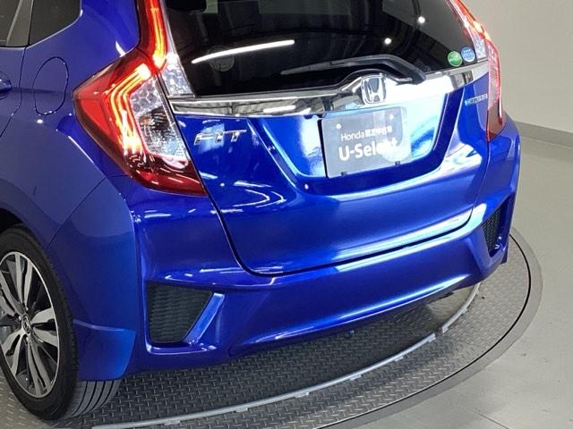 フィットハイブリッド Ｓパッケージ　純正メモリーナビ　衝突低減ブレーキ　点検記録簿　サイドエアバック　リアカメラ　ＵＳＢ　ＶＳＡ　クルコン　地デジＴＶ　イモビライザー　パワーウィンドウ　スマキー　ＤＶＤ再生　ナビＴＶ　ＥＴＣ付　パワステ（30枚目）