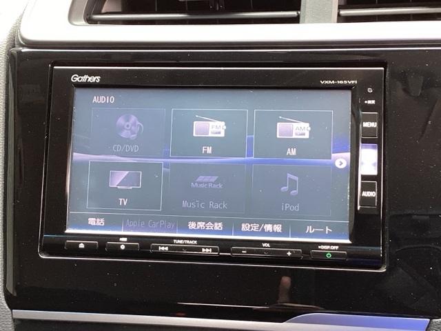 フィットハイブリッド Fパッケージ 純正メモリーナビ ドラレコ リアカメラ 地デジTV 盗難警報装置 記録簿有り AUTOエアコン Dレコ 助手席エアバック ECON ETC付き リヤカメラ ABS付 DVD視聴 横滑り防止システム(11枚目)