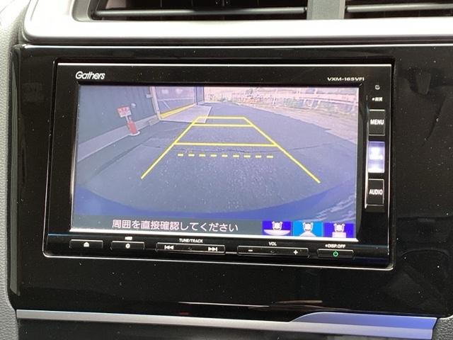 フィットハイブリッド Fパッケージ 純正メモリーナビ ドラレコ リアカメラ 地デジTV 盗難警報装置 記録簿有り AUTOエアコン Dレコ 助手席エアバック ECON ETC付き リヤカメラ ABS付 DVD視聴 横滑り防止システム(12枚目)