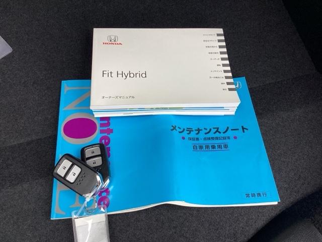 フィットハイブリッド Fパッケージ 純正メモリーナビ ドラレコ リアカメラ 地デジTV 盗難警報装置 記録簿有り AUTOエアコン Dレコ 助手席エアバック ECON ETC付き リヤカメラ ABS付 DVD視聴 横滑り防止システム(19枚目)