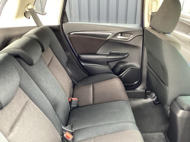 フィットハイブリッド Fパッケージ 純正メモリーナビ ドラレコ リアカメラ 地デジTV 盗難警報装置 記録簿有り AUTOエアコン Dレコ 助手席エアバック ECON ETC付き リヤカメラ ABS付 DVD視聴 横滑り防止システム(56枚目)