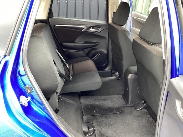 フィットハイブリッド Fパッケージ 純正メモリーナビ ドラレコ リアカメラ 地デジTV 盗難警報装置 記録簿有り AUTOエアコン Dレコ 助手席エアバック ECON ETC付き リヤカメラ ABS付 DVD視聴 横滑り防止システム(57枚目)