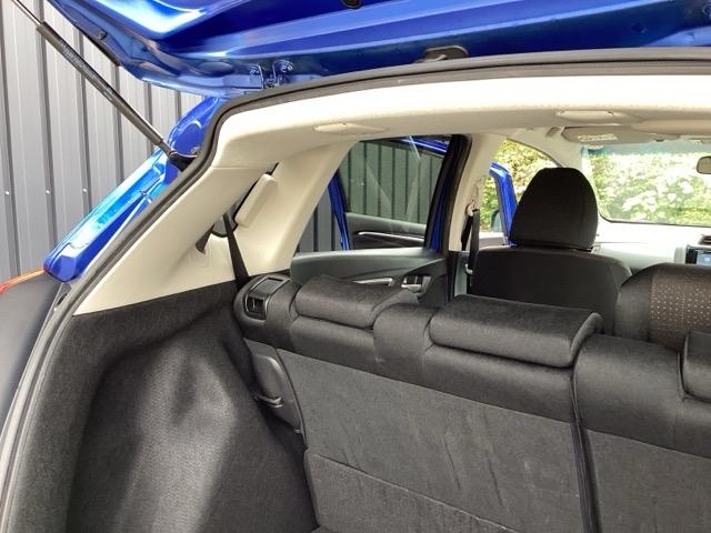 フィットハイブリッド Fパッケージ 純正メモリーナビ ドラレコ リアカメラ 地デジTV 盗難警報装置 記録簿有り AUTOエアコン Dレコ 助手席エアバック ECON ETC付き リヤカメラ ABS付 DVD視聴 横滑り防止システム(60枚目)