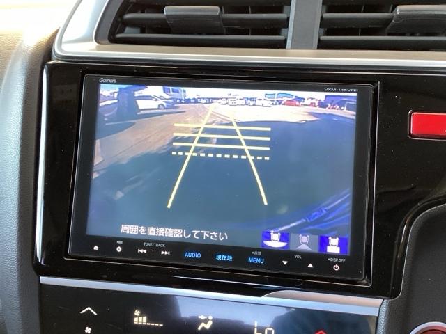 フィット １３Ｇ・Ｌパッケージ　純正ナビ　フルセグ　リアカメラ　軽減ブレーキ　盗難警報装置　Ｂカメ　Ｓキー　フルオートエアコン　ナビＴＶ　リモコンキー　サイドＳＲＳ　横滑り防止機能　エアバック　アイスト　ＥＴＣ付き　パワーウィンド（12枚目）