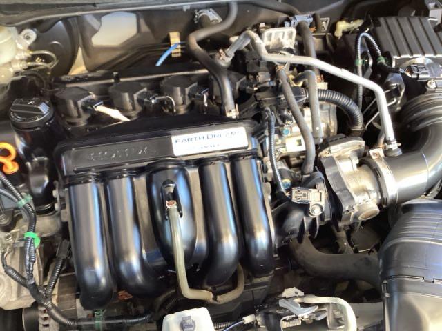 フィット １３Ｇ・Ｌパッケージ　純正ナビ　フルセグ　リアカメラ　軽減ブレーキ　盗難警報装置　Ｂカメ　Ｓキー　フルオートエアコン　ナビＴＶ　リモコンキー　サイドＳＲＳ　横滑り防止機能　エアバック　アイスト　ＥＴＣ付き　パワーウィンド（23枚目）