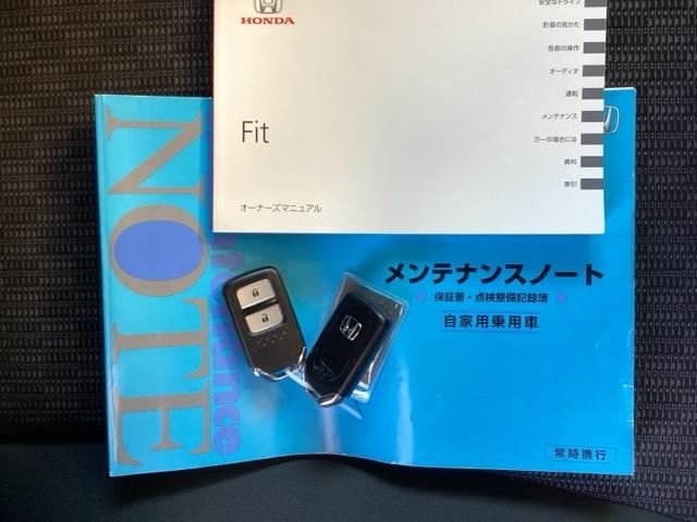 フィット １３Ｇ・Ｌパッケージ　純正ナビ　フルセグ　リアカメラ　軽減ブレーキ　盗難警報装置　Ｂカメ　Ｓキー　フルオートエアコン　ナビＴＶ　リモコンキー　サイドＳＲＳ　横滑り防止機能　エアバック　アイスト　ＥＴＣ付き　パワーウィンド（24枚目）