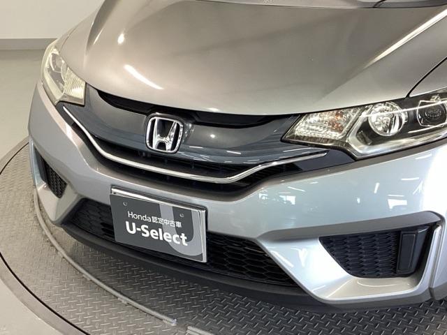 フィット １３Ｇ・Ｌパッケージ　純正ナビ　フルセグ　リアカメラ　軽減ブレーキ　盗難警報装置　Ｂカメ　Ｓキー　フルオートエアコン　ナビＴＶ　リモコンキー　サイドＳＲＳ　横滑り防止機能　エアバック　アイスト　ＥＴＣ付き　パワーウィンド（26枚目）