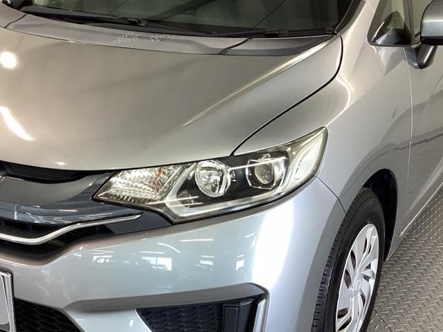 フィット １３Ｇ・Ｌパッケージ　純正ナビ　フルセグ　リアカメラ　軽減ブレーキ　盗難警報装置　Ｂカメ　Ｓキー　フルオートエアコン　ナビＴＶ　リモコンキー　サイドＳＲＳ　横滑り防止機能　エアバック　アイスト　ＥＴＣ付き　パワーウィンド（27枚目）