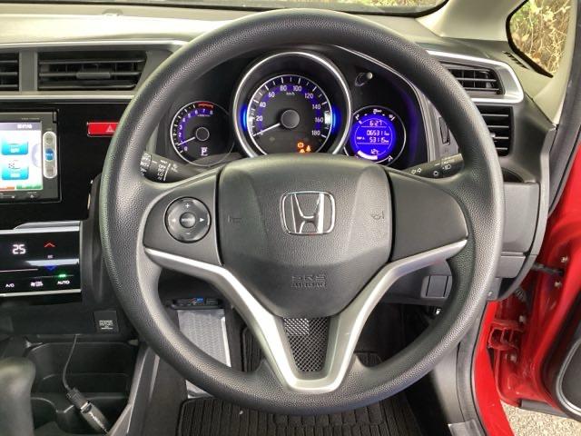 フィット １３Ｇ・Ｌパッケージ　純正メモリナビ　衝突低減ブレーキ　ＥＴＣ　軽減ブレーキ　盗難警報装置　Ｂカメ　Ｓキー　ワンセグ　フルオートエアコン　ナビＴＶ　リモコンキー　サイドＳＲＳ　横滑り防止機能　エアバック　アイスト　ドラレコ（14枚目）