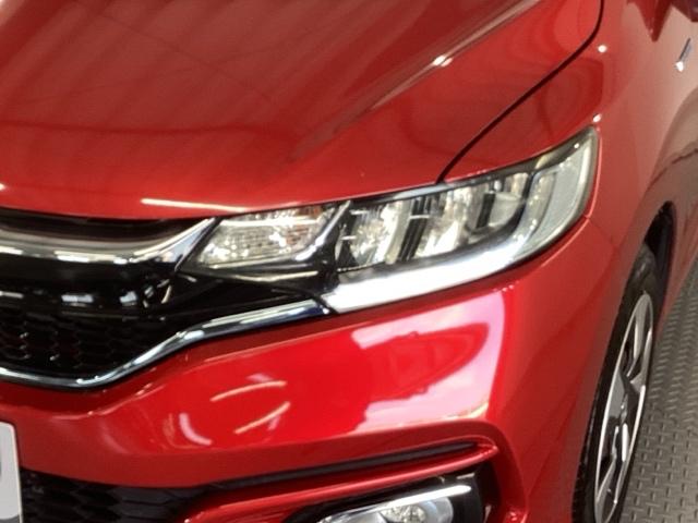 フィットハイブリッド Lホンダセンシング 純正ナビ フルセグ リアカメラ 軽減ブレーキ Rカメ LED サイドSRS 横滑り防止 ドライブレコーダー ナビTV パワーステアリング 盗難防止装置 オートクルーズ ETC車載器 DVD再生 ABS(28枚目)