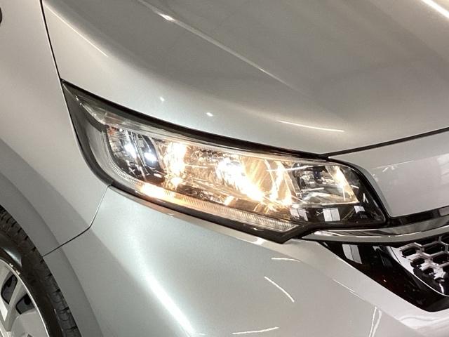 フリード Ｇ・ホンダセンシング　メモリーナビ　ＥＴＣ　リアカメラ　スマートキーＰスタート　ＵＳＢ入力　盗難防止システム　横滑防止装置　ナビＴＶ　記録簿　クルコン　パワーウインド　ウォークスルー　ＤＶＤ再生機能　エアバック　三列シート（22枚目）