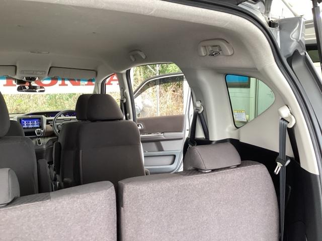 フリード Ｇ・ホンダセンシング　メモリーナビ　ＥＴＣ　リアカメラ　スマートキーＰスタート　ＵＳＢ入力　盗難防止システム　横滑防止装置　ナビＴＶ　記録簿　クルコン　パワーウインド　ウォークスルー　ＤＶＤ再生機能　エアバック　三列シート（63枚目）