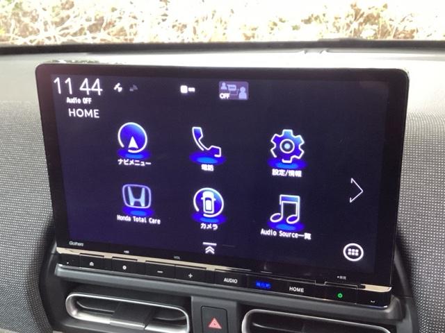 フリード ｅ：ＨＥＶエアーＥＸ　ＥＴＣ／純正ナビ／バックモニター／ホンダセンシング／全周囲カメラ　セキュリティアラーム　横滑り防止　エアコン　ＤＶＤ再生可　クルコン　誤発進抑制機能　アラウンドビューモニター　ナビ＆ＴＶ　三列シート（9枚目）