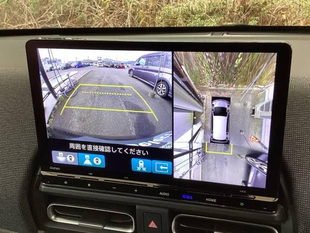 フリード ｅ：ＨＥＶエアーＥＸ　ＥＴＣ／純正ナビ／バックモニター／ホンダセンシング／全周囲カメラ　セキュリティアラーム　横滑り防止　エアコン　ＤＶＤ再生可　クルコン　誤発進抑制機能　アラウンドビューモニター　ナビ＆ＴＶ　三列シート（10枚目）