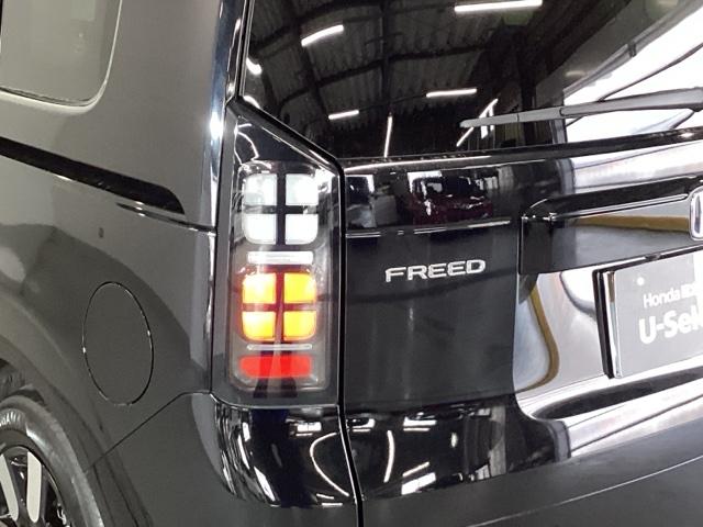 フリード ｅ：ＨＥＶエアーＥＸ　ＥＴＣ／純正ナビ／バックモニター／ホンダセンシング／全周囲カメラ　セキュリティアラーム　横滑り防止　エアコン　ＤＶＤ再生可　クルコン　誤発進抑制機能　アラウンドビューモニター　ナビ＆ＴＶ　三列シート（29枚目）