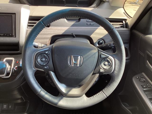 フリードハイブリッド ハイブリッド・Ｇホンダセンシング　Ｈｏｎｄａ　ＳＥＮＳＩＮＧ・純正ナビ・Ｂｌｕｅｔｏｏｔｈ対応・バックカメラ・両側電動スライドドア・シートヒーター・ＥＴＣ（5枚目）