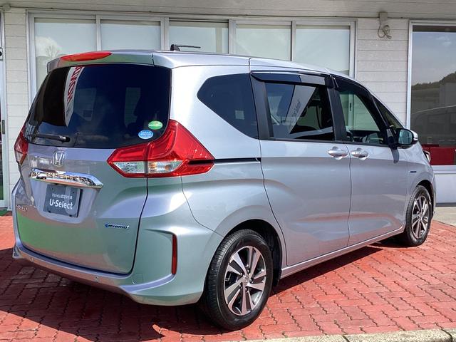 フリードハイブリッド ハイブリッド・Ｇホンダセンシング　Ｈｏｎｄａ　ＳＥＮＳＩＮＧ・純正ナビ・Ｂｌｕｅｔｏｏｔｈ対応・バックカメラ・両側電動スライドドア・シートヒーター・ＥＴＣ（8枚目）
